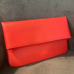 Neiman Marcus red fold over clutch